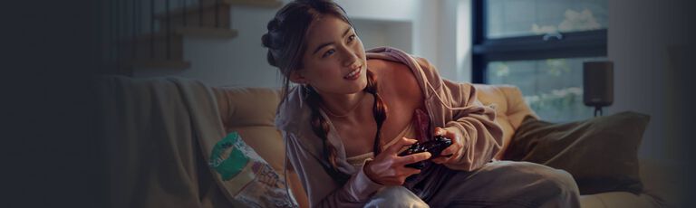 young woman playing video games